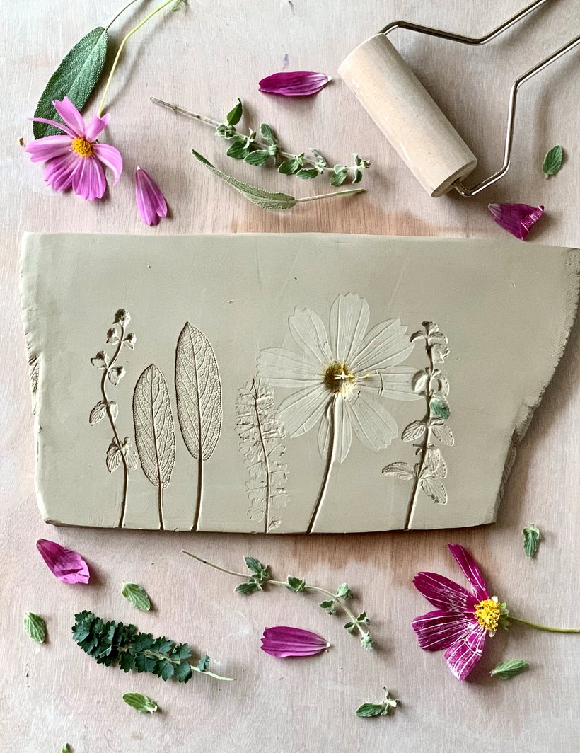 My handmade clay flower slab, prepping each petal and leaf took